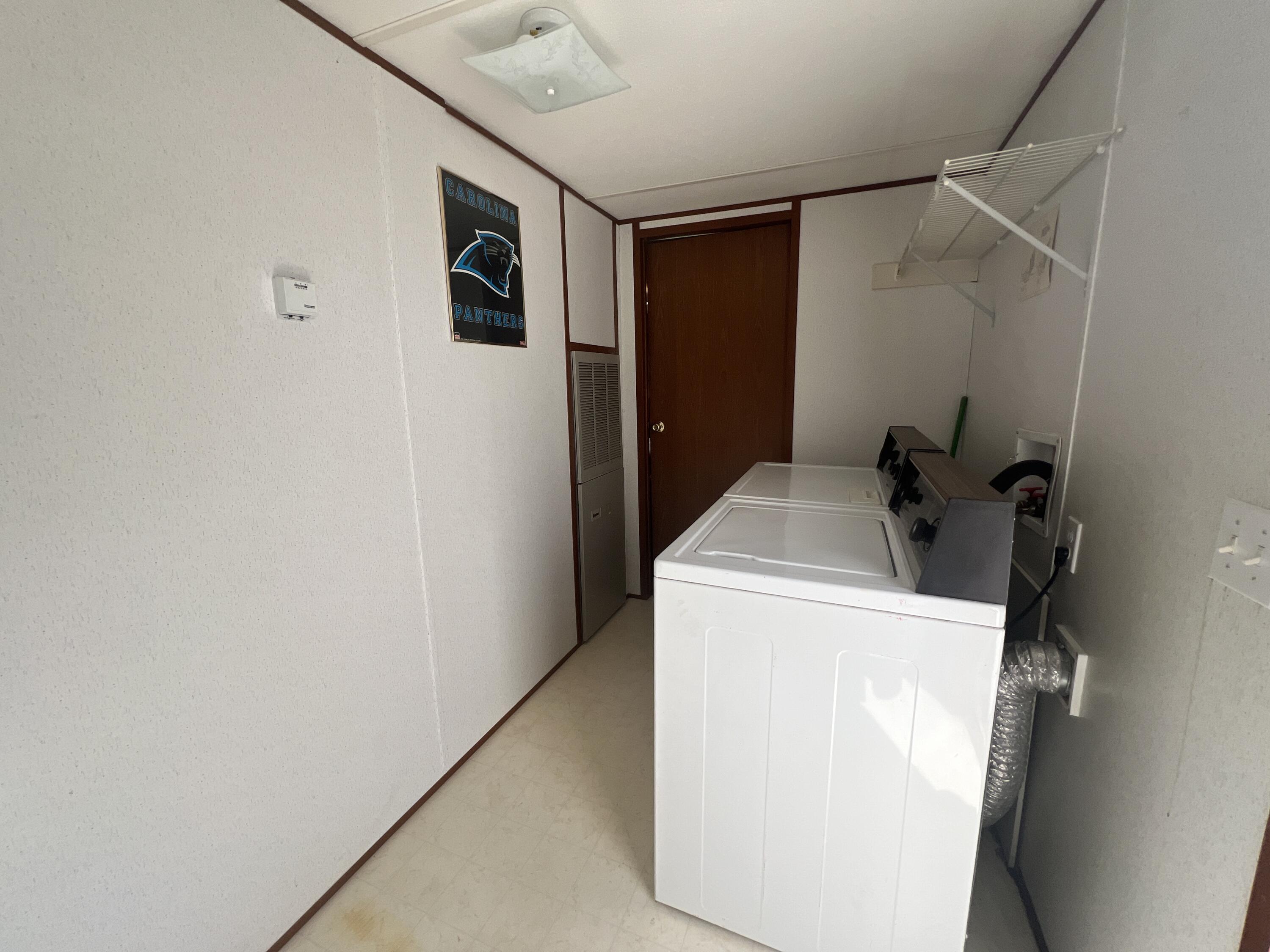1494 Green Bay Road Chatham, VA 24531 - Photo 51 of 54 a utility room with dryer and washer