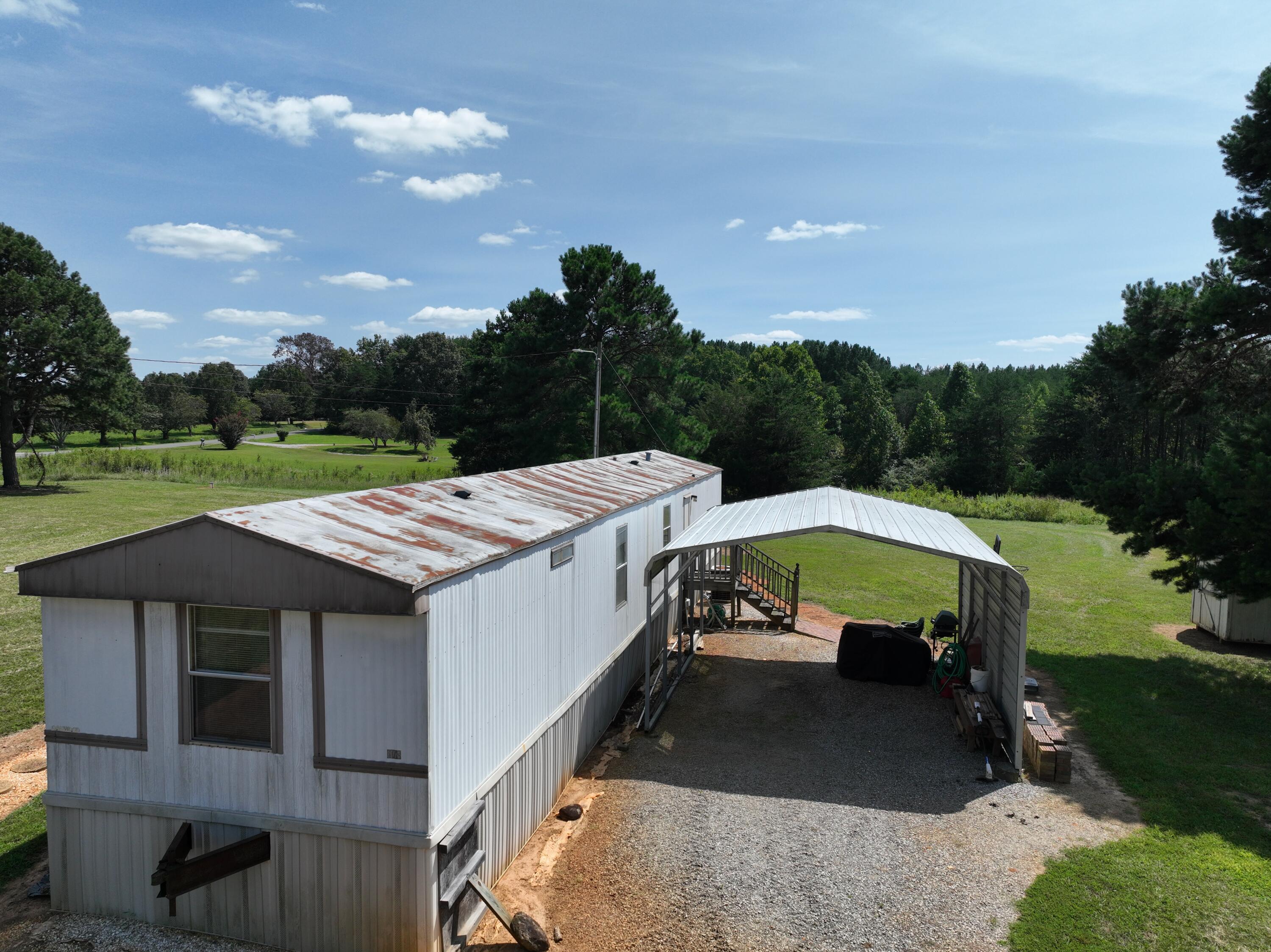 1494 Green Bay Road Chatham, VA 24531 - Photo 6 of 54 a view of a house with pool and yard