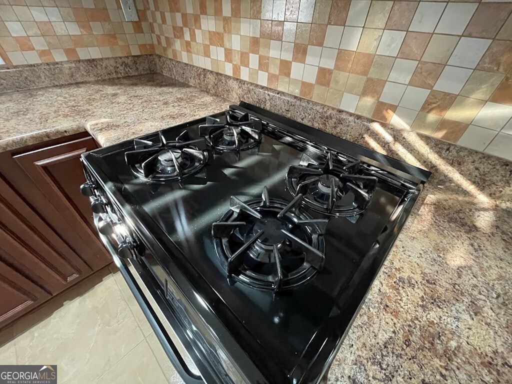 2311 St George Lane Albany, GA 31707 - Photo 17 of 39 a close up of a stove top oven