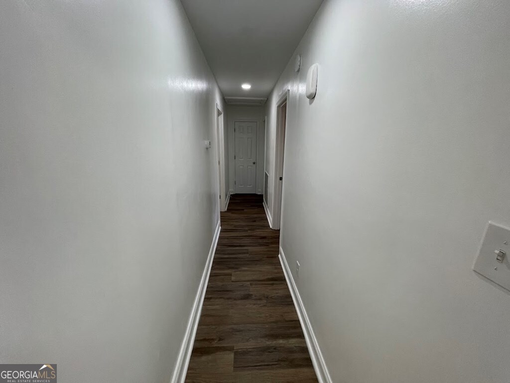 2311 St George Lane Albany, GA 31707 - Photo 19 of 39 a view of a hallway with a staircase