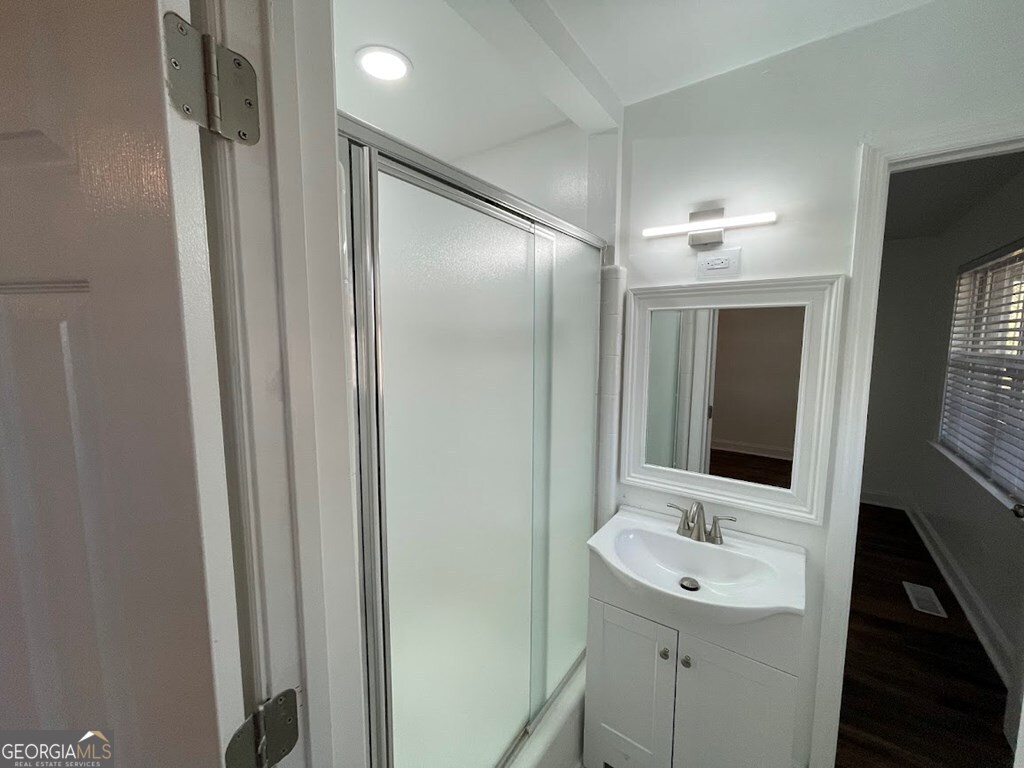 2311 St George Lane Albany, GA 31707 - Photo 23 of 39 a bathroom with a sink and a mirror