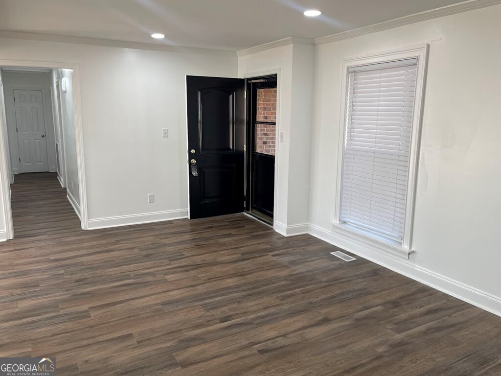 2311 St George Lane Albany, GA 31707 - Photo 5 of 39 a view of an empty room with wooden floor and closet