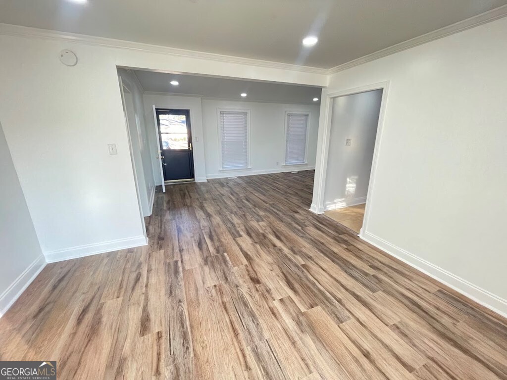 2311 St George Lane Albany, GA 31707 - Photo 6 of 39 a view of a room with wooden floor and staircase