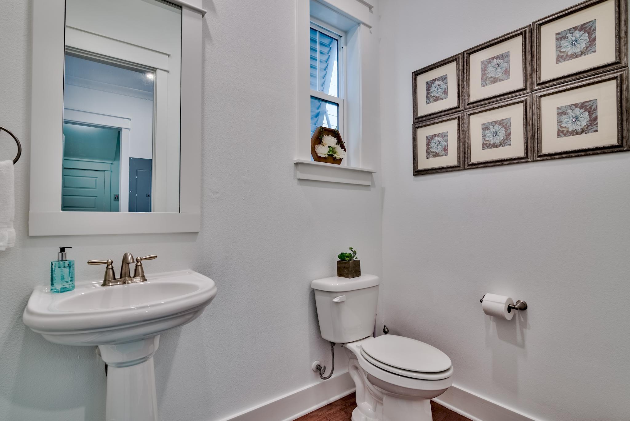 18 Milestone Drive Inlet Beach, Unit A Inlet Beach, FL 32461 - Photo 8 of 39 a bathroom with a toilet and a sink