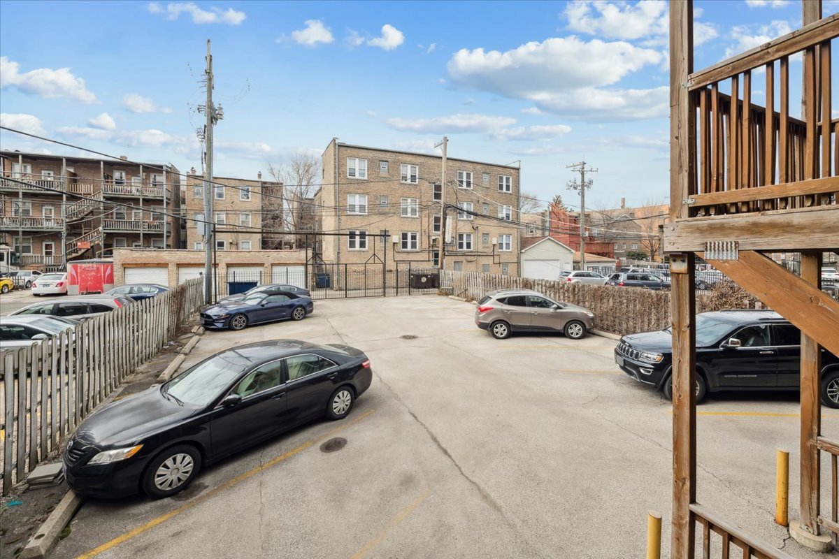 4028 North Sheridan Road, Unit 1R Chicago, IL 60613 - Photo 12 of 15 a car parked in front of a building
