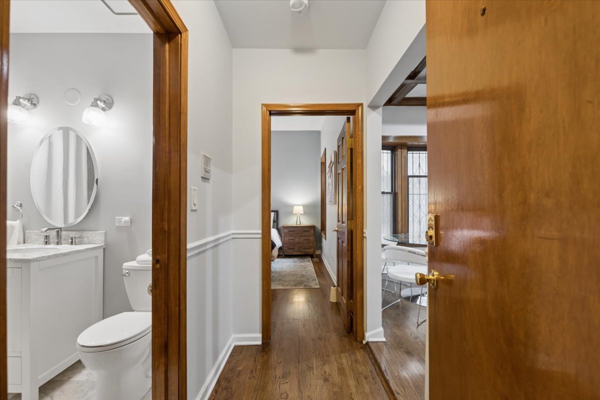 4028 North Sheridan Road, Unit 1R Chicago, IL 60613 - Photo 10 of 15 a bathroom with a sink and mirror