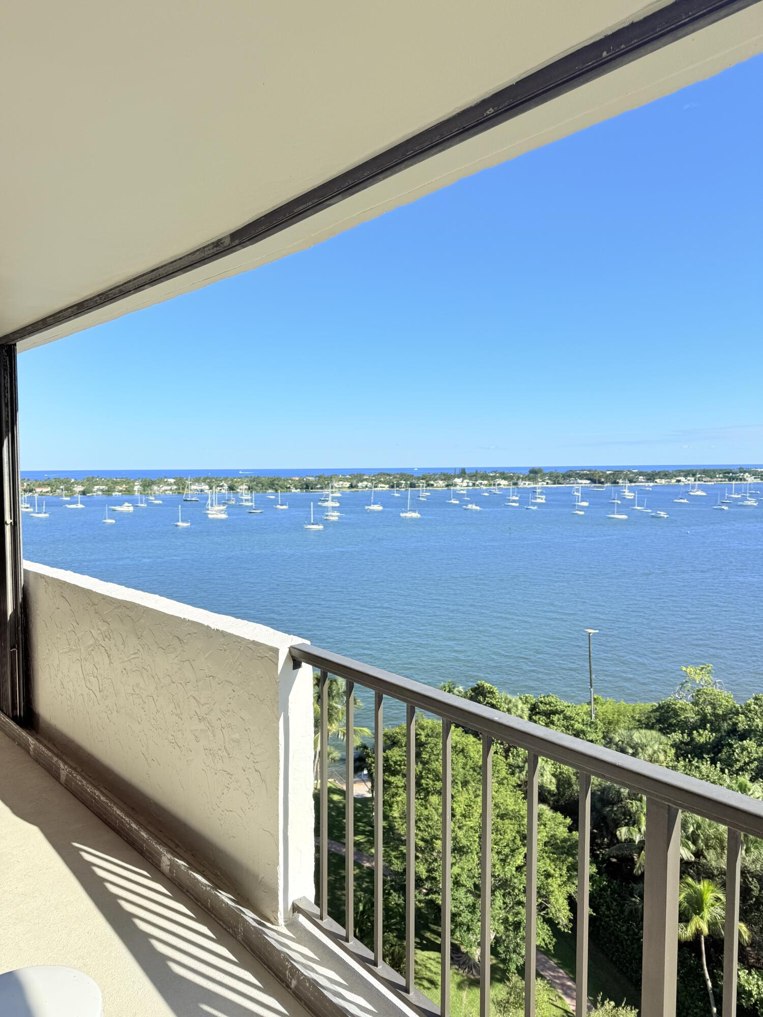 5200 North Flagler Drive, Unit 1406 West Palm Beach, FL 33407 - Photo 11 of 31 a view of ocean from a balcony