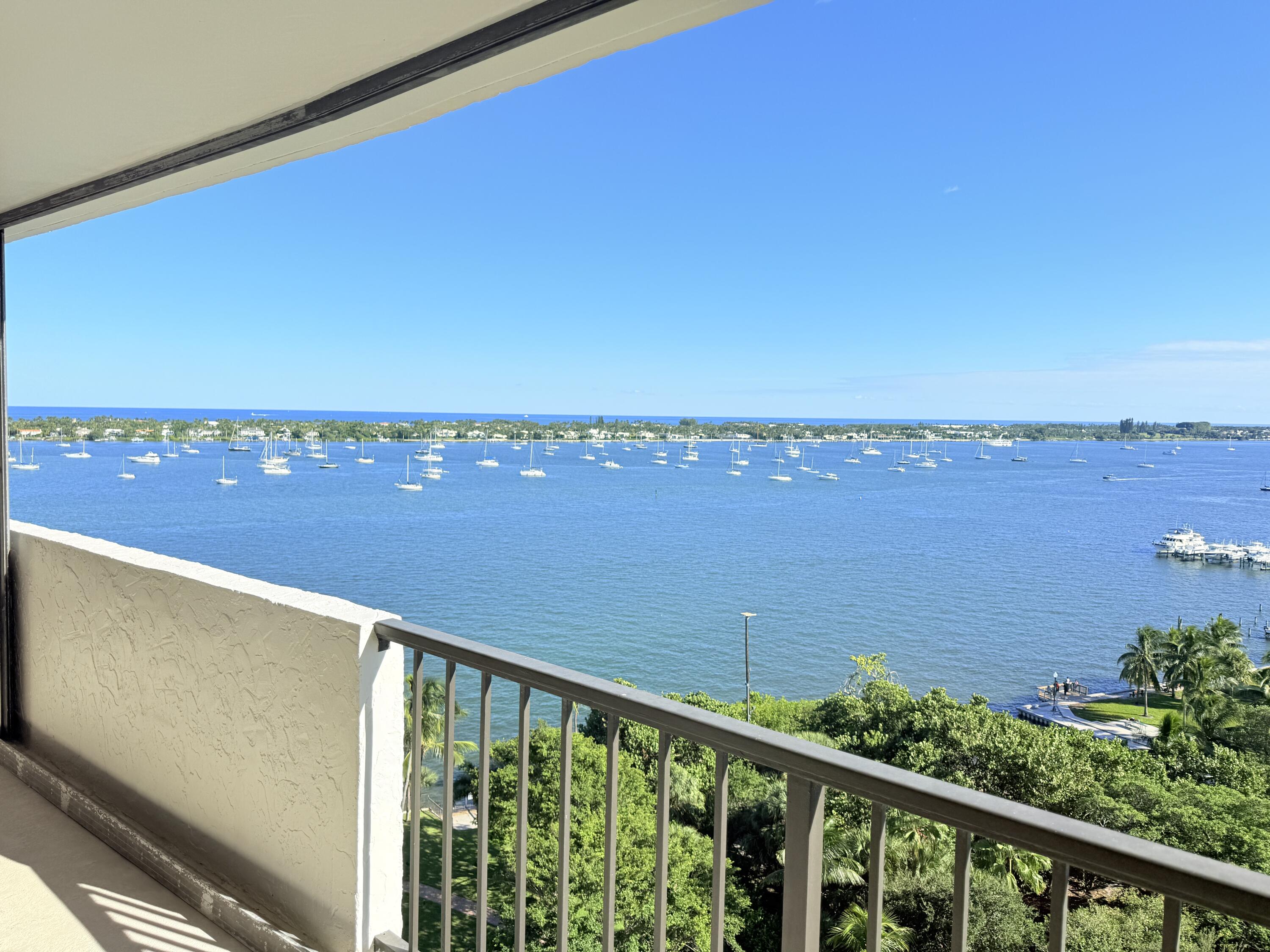 5200 North Flagler Drive, Unit 1406 West Palm Beach, FL 33407 - Photo 13 of 31 a view of ocean from a balcony