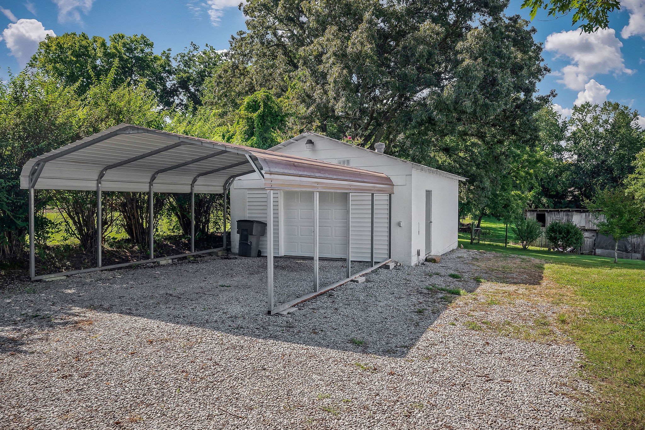 220 Higginbotham Road McMinnville, TN 37110 - Photo 17 of 21 a view of a house with a yard and tree
