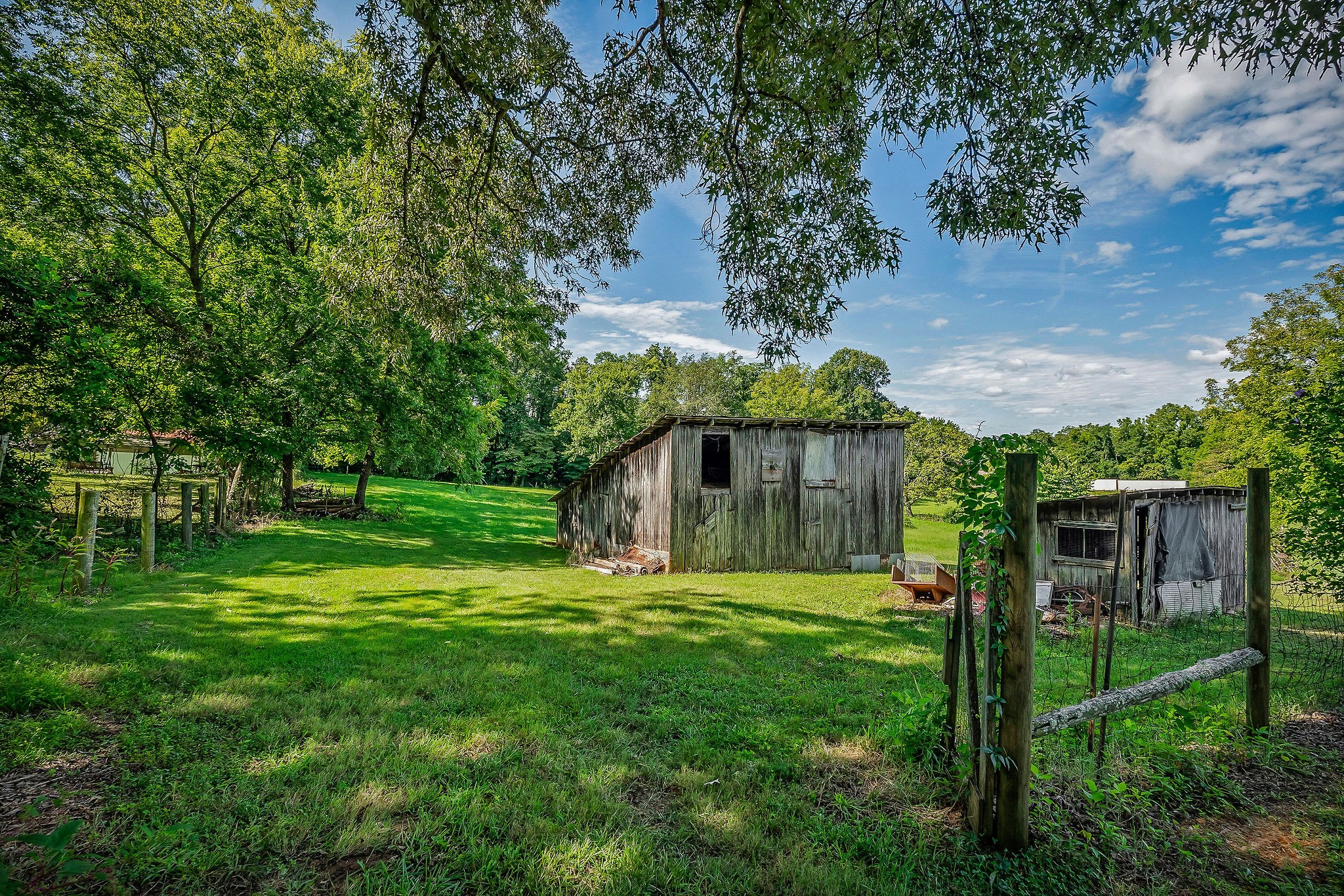220 Higginbotham Road McMinnville, TN 37110 - Photo 20 of 21 a front view of a house with a yard and trees