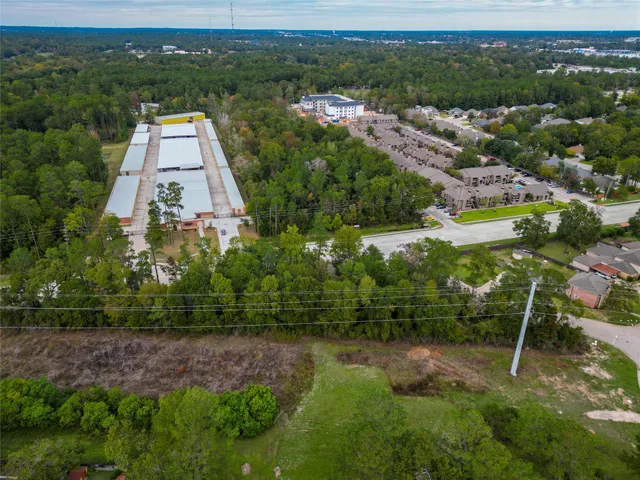 an aerial view of residential house with outdoor space