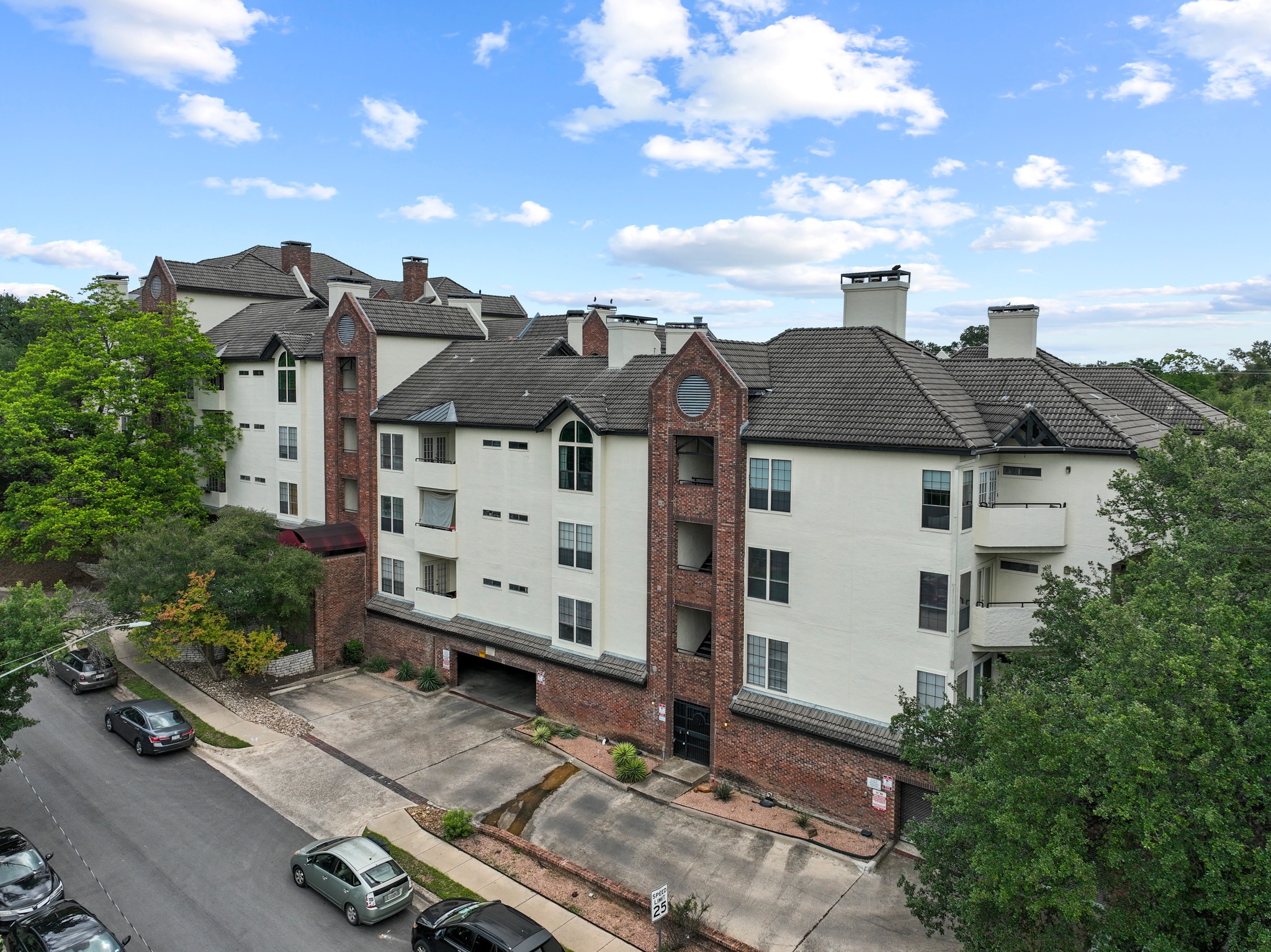 3001 Cedar Street, Unit A214 Austin, TX 78705 - Photo 1 of 23 aerial view of a house with a yard