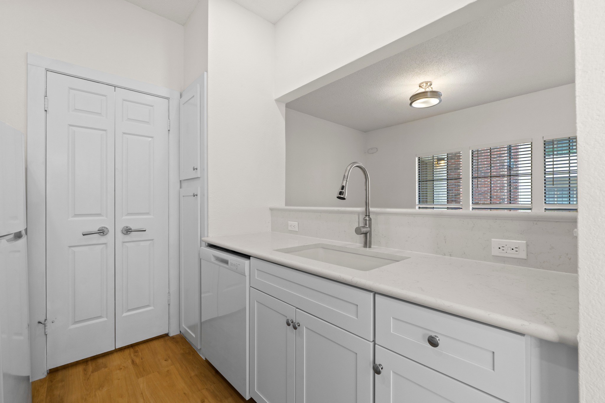 3001 Cedar Street, Unit A214 Austin, TX 78705 - Photo 12 of 23 a bathroom with a sink and a mirror