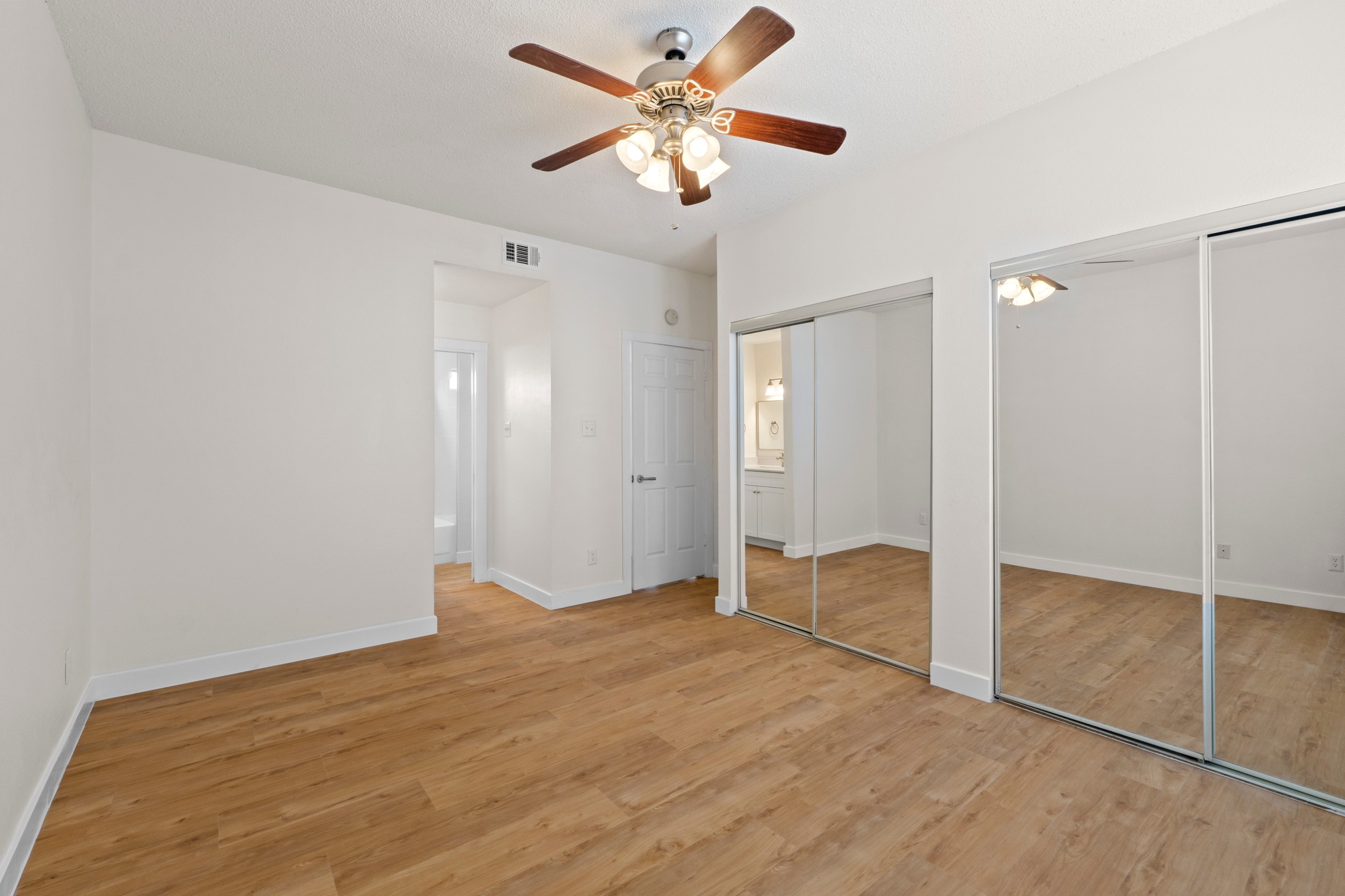 3001 Cedar Street, Unit A214 Austin, TX 78705 - Photo 16 of 23 wooden floor in an empty room