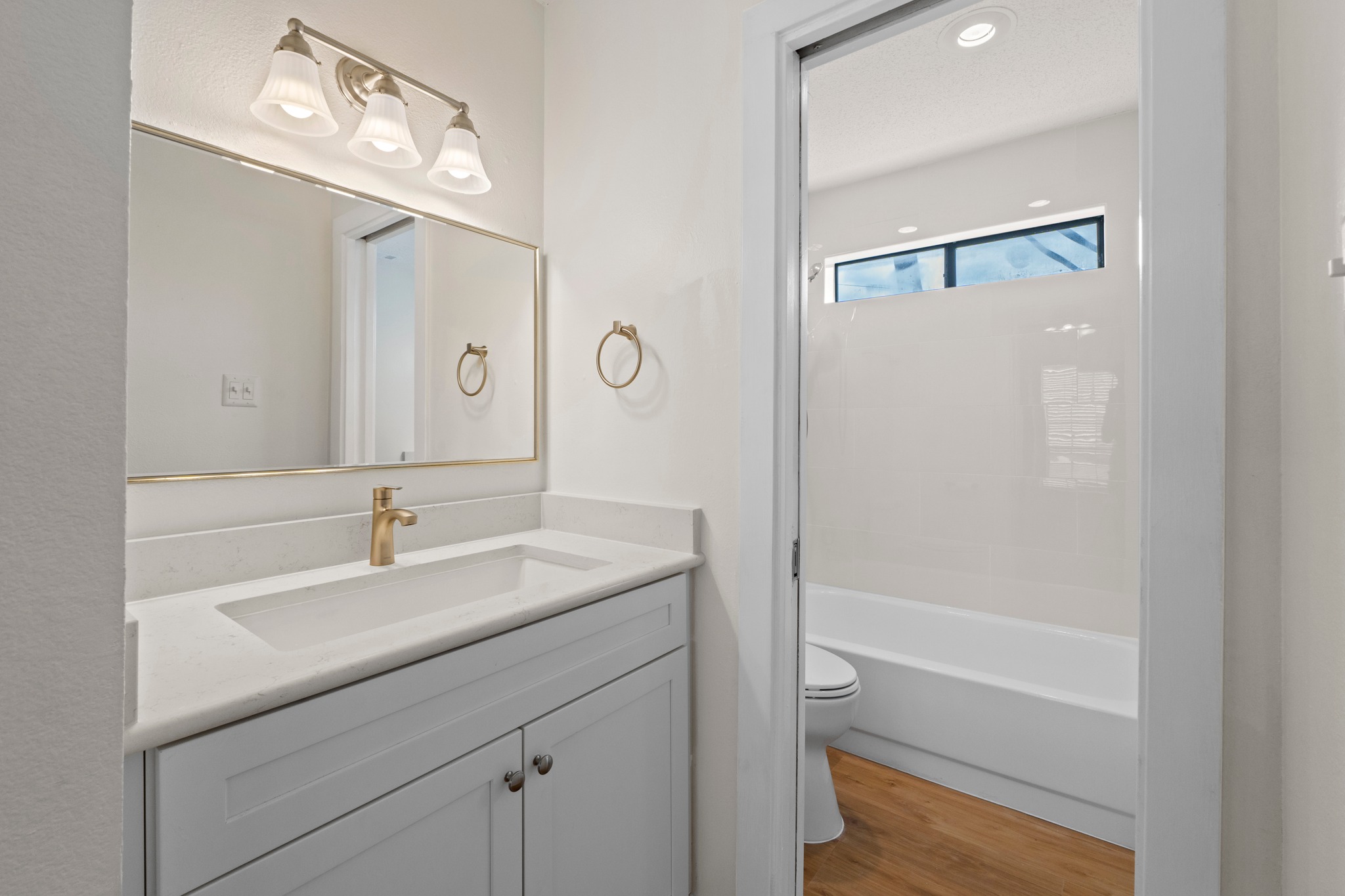 3001 Cedar Street, Unit A214 Austin, TX 78705 - Photo 19 of 23 a bathroom with a sink a toilet and shower