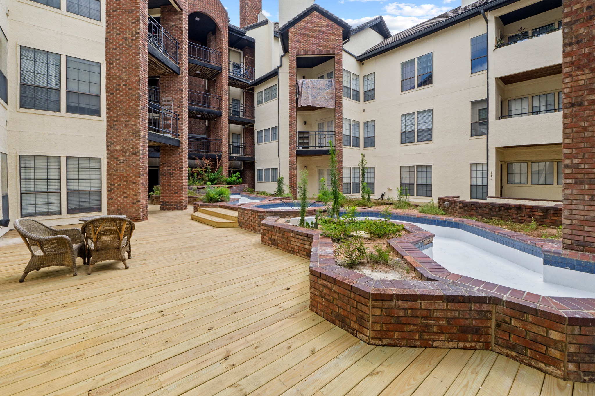 3001 Cedar Street, Unit A214 Austin, TX 78705 - Photo 22 of 23 a view of a building with lounge chair