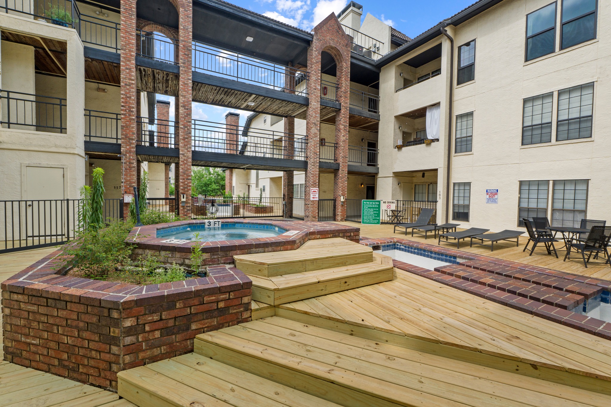 3001 Cedar Street, Unit A214 Austin, TX 78705 - Photo 23 of 23 a view of a house with swimming pool and sitting area