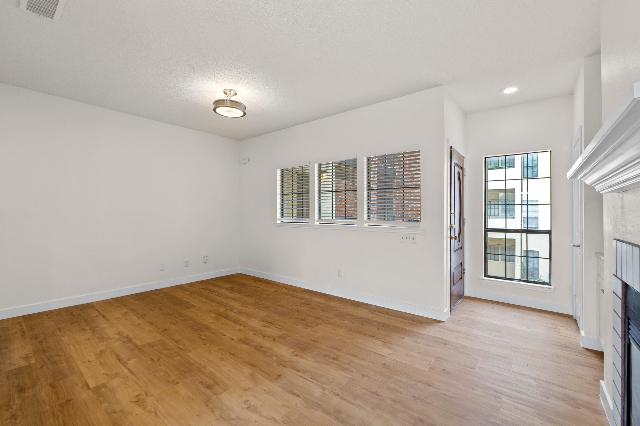 3001 Cedar Street, Unit A214 Austin, TX 78705 - Photo 7 of 23 an empty room with windows