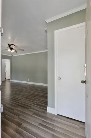 a view of a livingroom with wooden floor