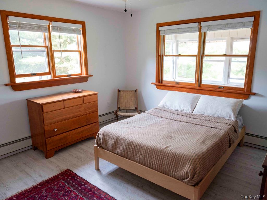 284 Ridge Road Hamden, NY 13782 - Photo 18 of 44 This bedroom, also on the first floor, offers a large closet, ceiling fan, and natural light