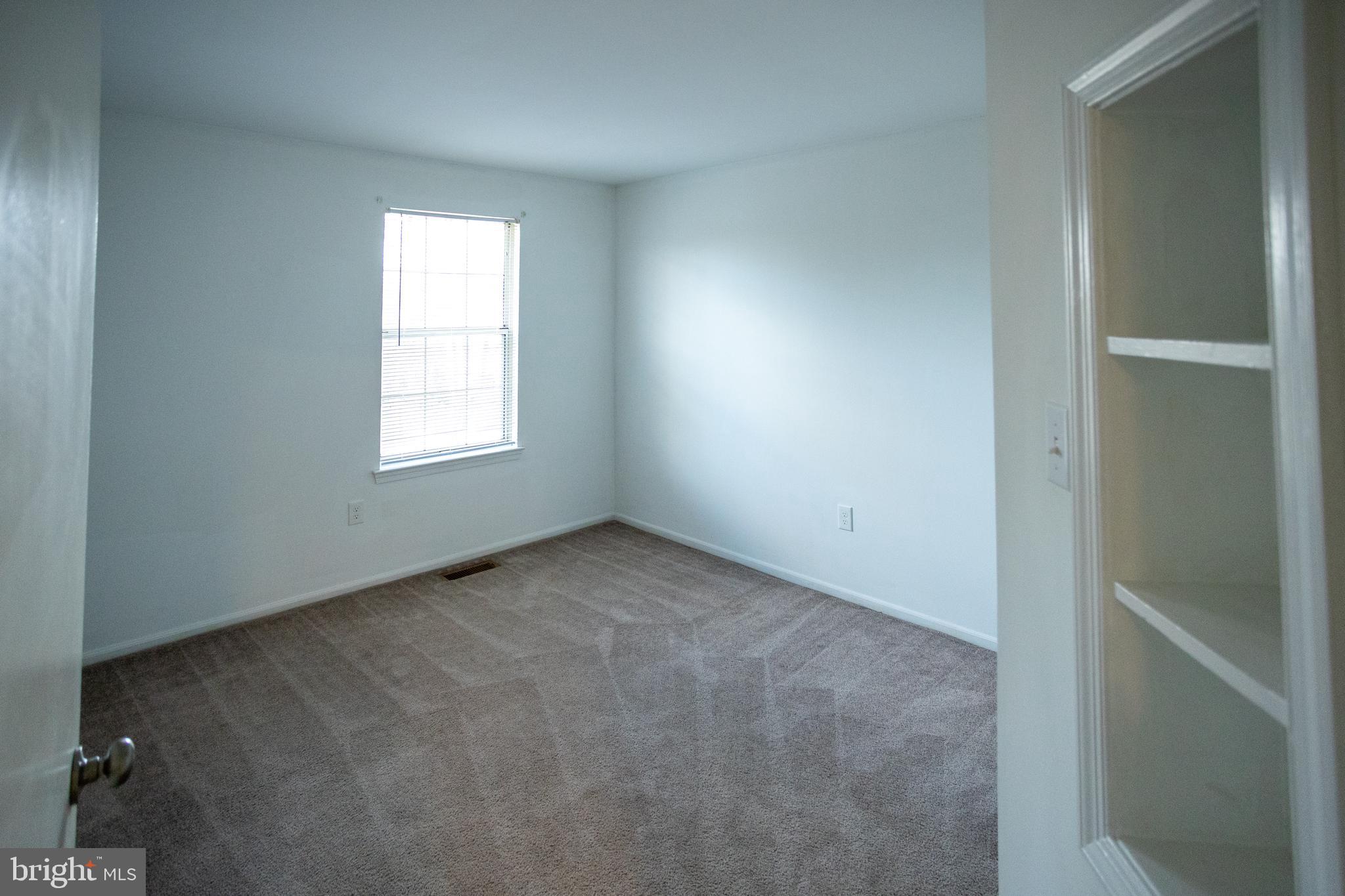 322 Kent Lane Perkasie, PA 18944 - Photo 25 of 36 an empty room with windows