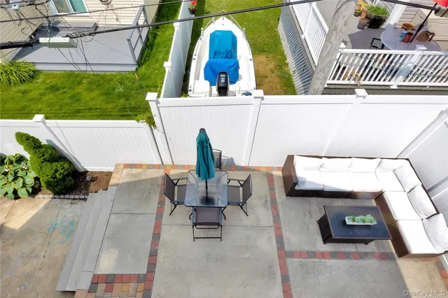 a view of roof deck with patio