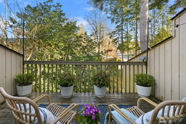 a view of balcony with furniture