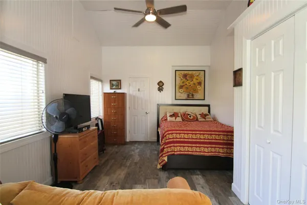a bedroom with a bed and furniture