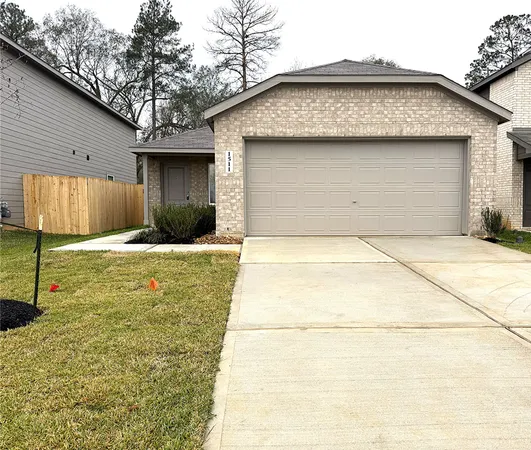 a view of a backyard of the house