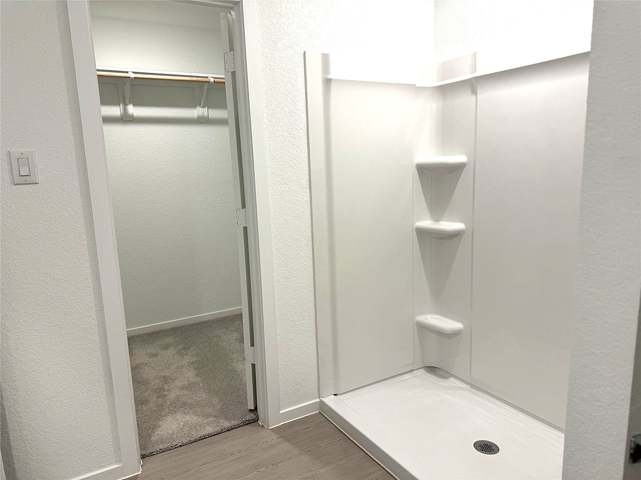 1511 Sunset Ridge Drive Conroe, TX 77306 - Photo 9 of 11 a bathroom view of a toilet and a shower