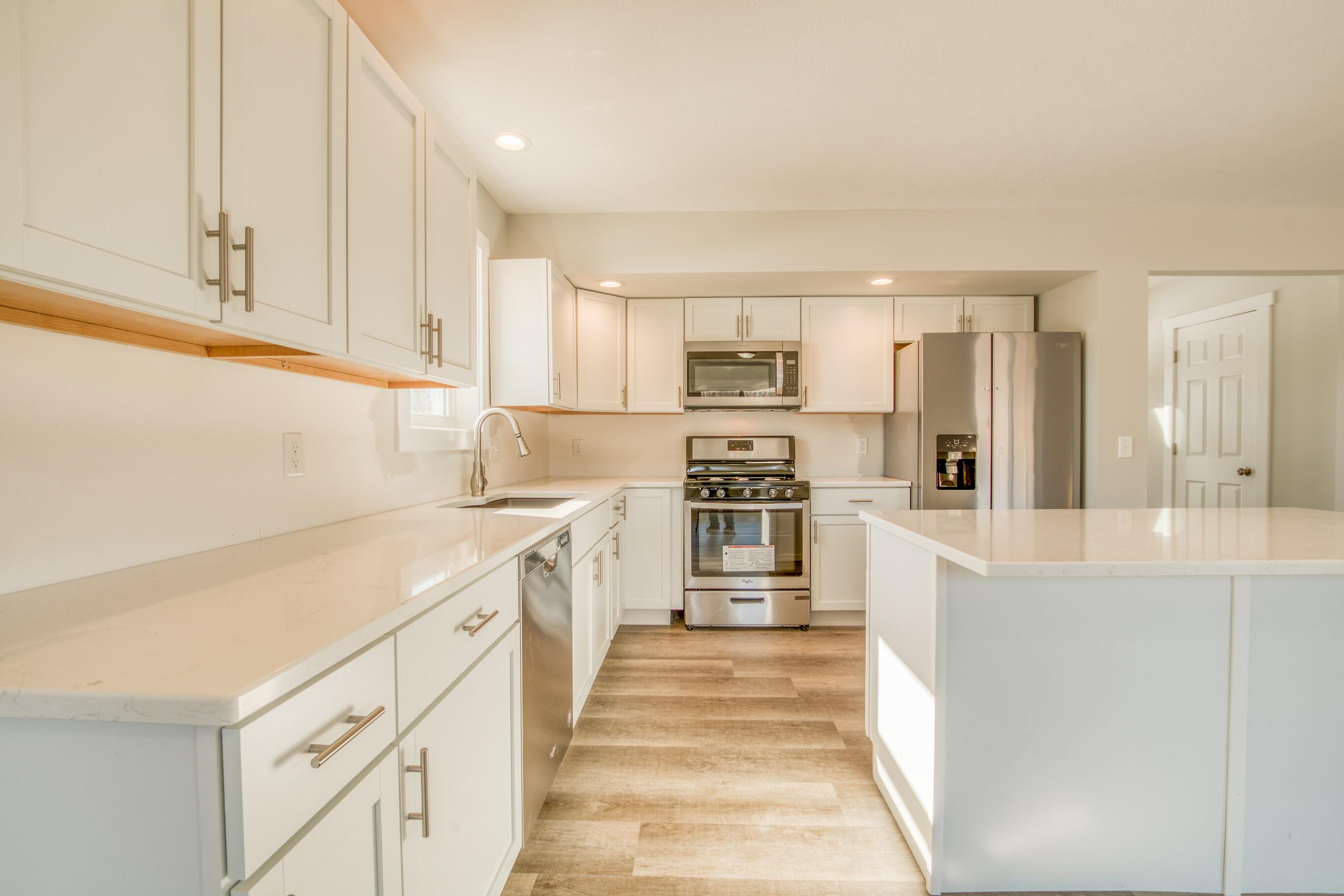 18191 Hunters Ridge Drive Morley, MI 49336 - Photo 5 of 8 Sample Kitchen (2 Story Peak 2 Layout)