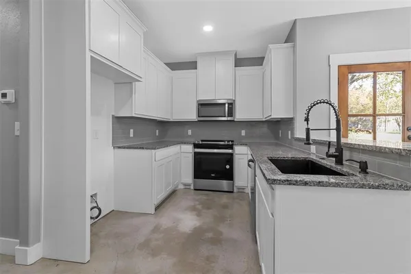 $1,400 | 1309 South 5th Avenue, Unit 1309, Denison, TX 75021