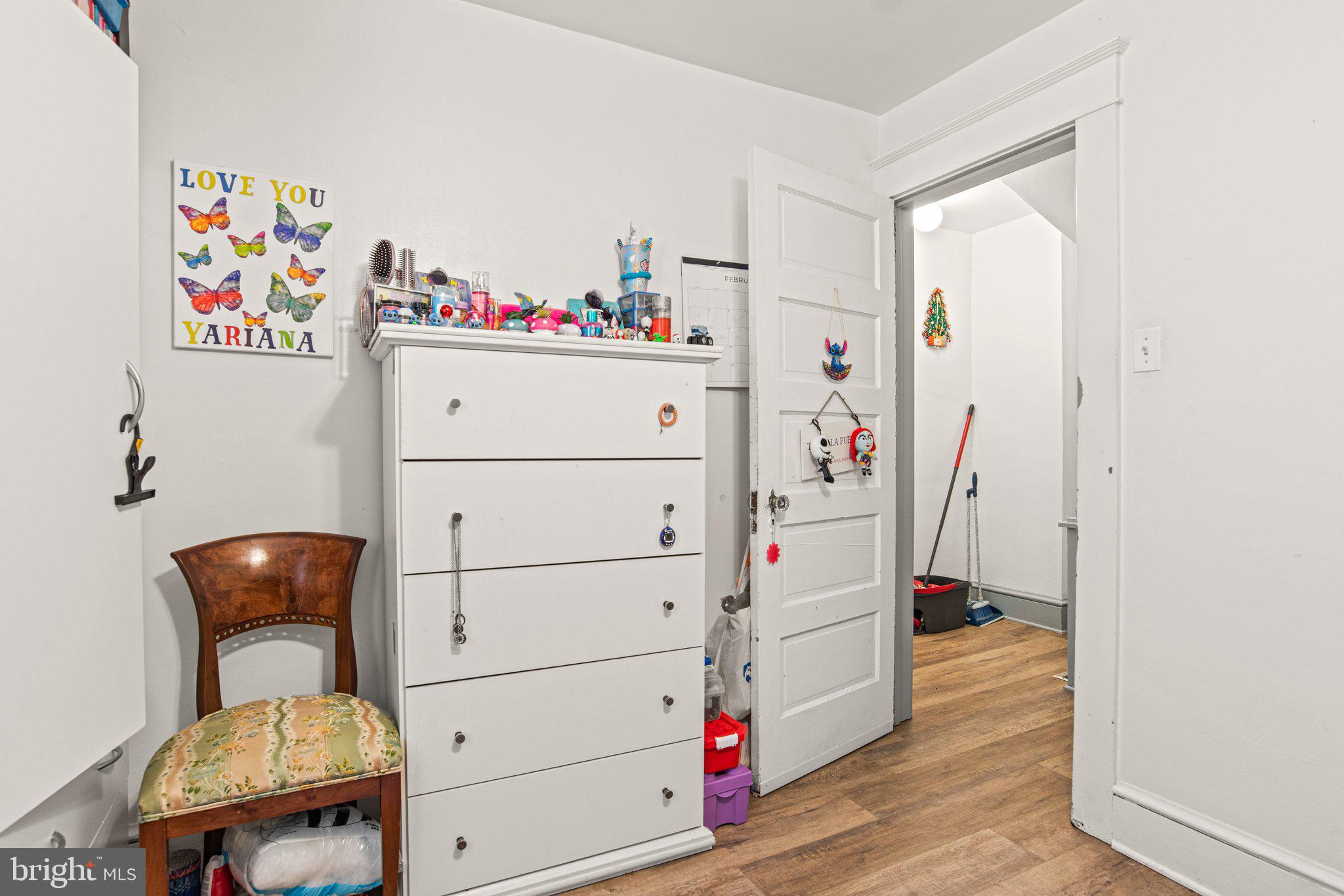 1024 Edison Street York, PA 17403 - Photo 19 of 30 a bedroom with a bed and wooden floor