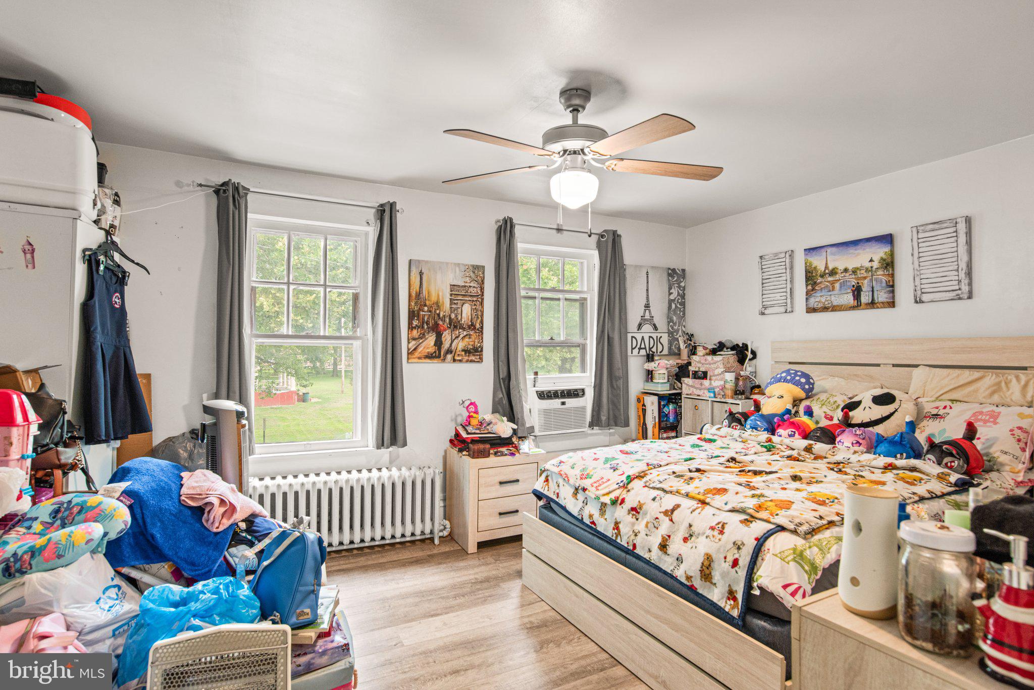 1024 Edison Street York, PA 17403 - Photo 20 of 30 a bedroom with a bed and a chandelier