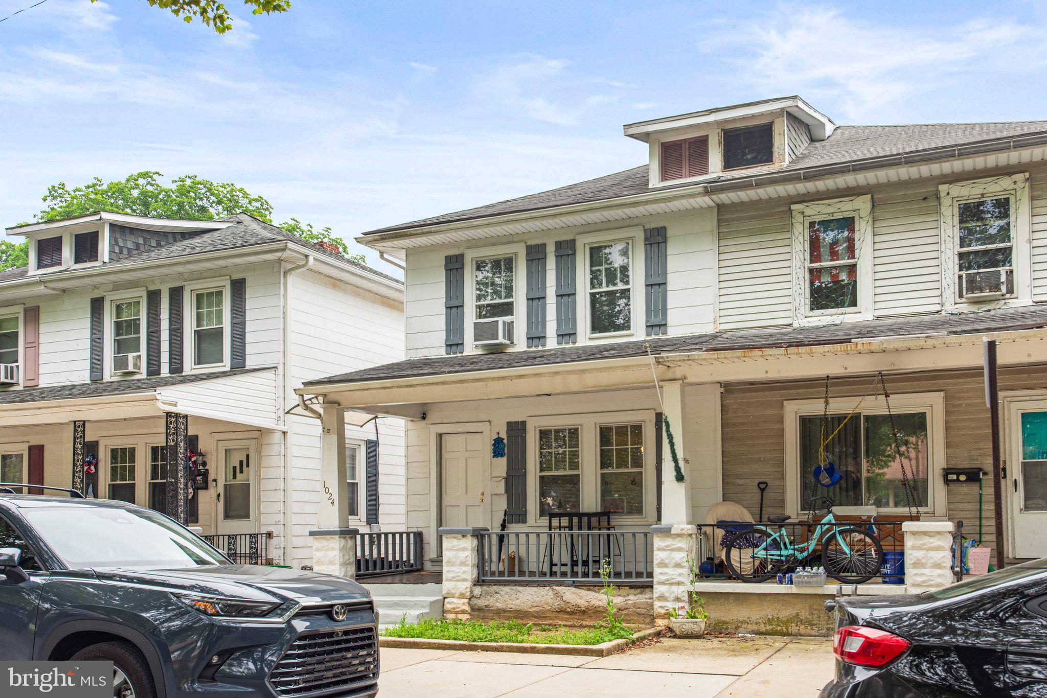 1024 Edison Street York, PA 17403 - Photo 2 of 30 a front view of a residential apartment building with a yard