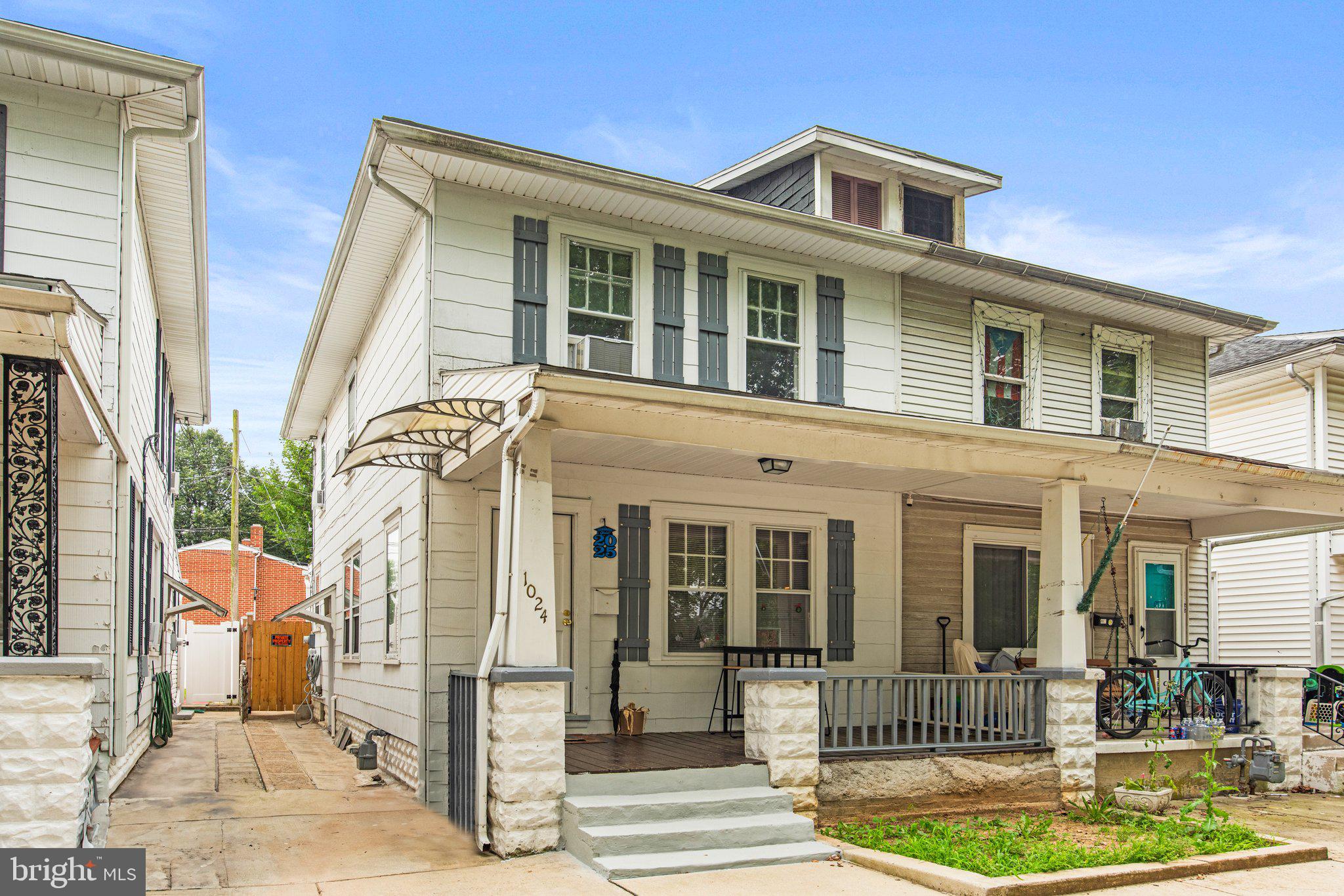 1024 Edison Street York, PA 17403 - Photo 4 of 30 a front view of a house with a yard