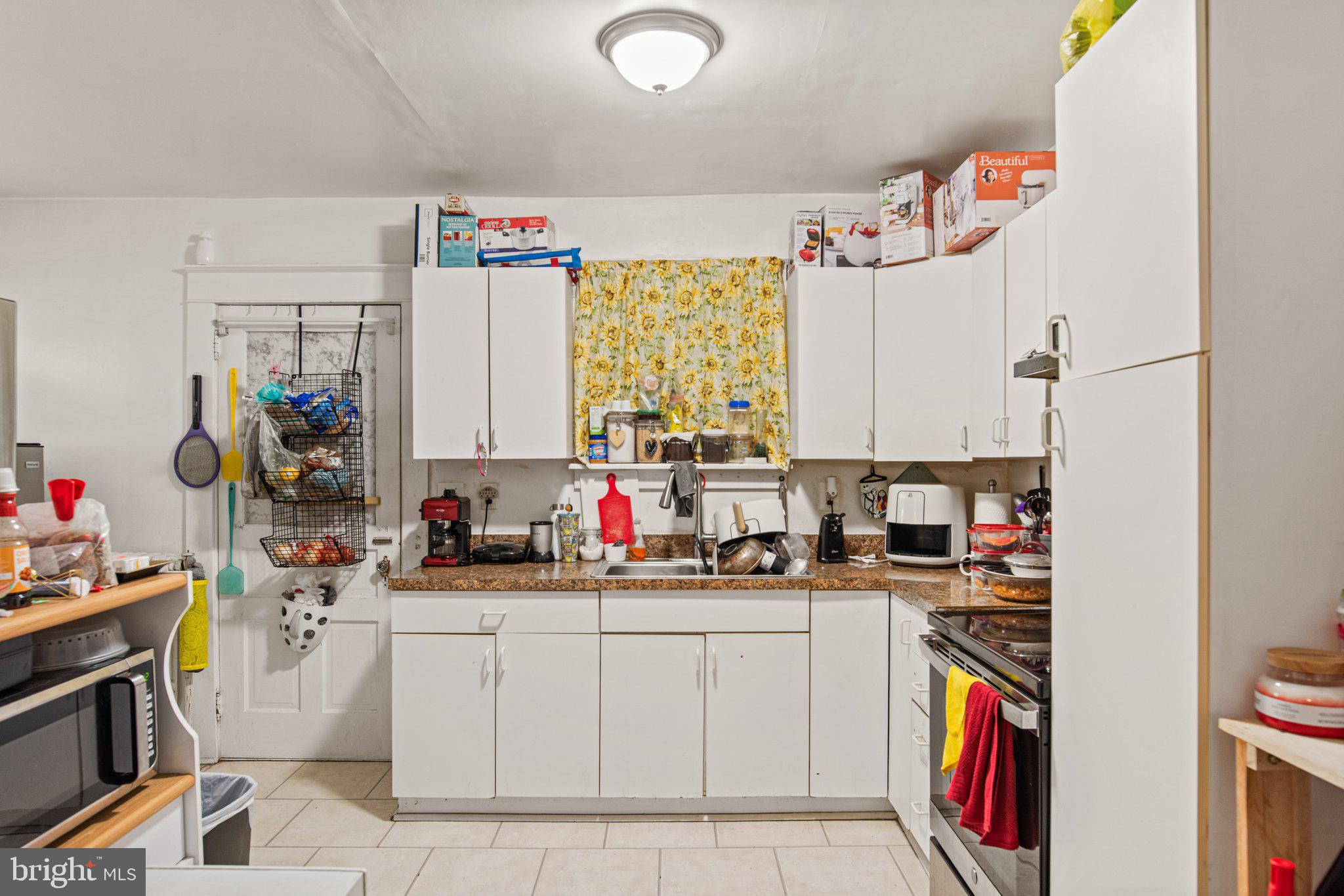 1024 Edison Street York, PA 17403 - Photo 10 of 30 a kitchen that has a sink and a stove in it