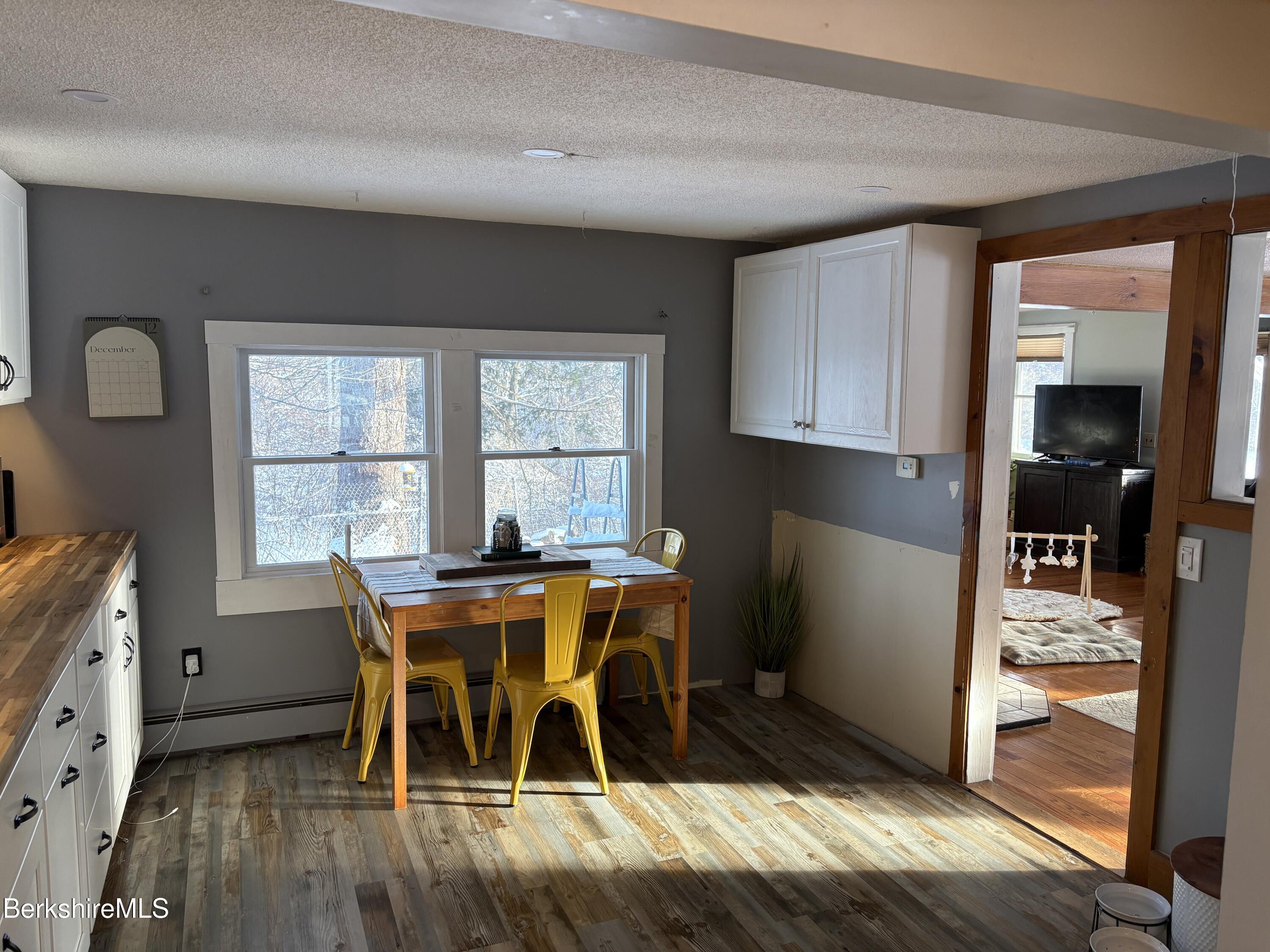20 Moscow Road West Stockbridge, MA 01266 - Photo 11 of 33 a view of a dining room with furniture and a window