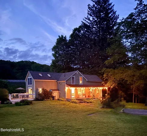 a kitchen with cabinets and stainless steel appliances