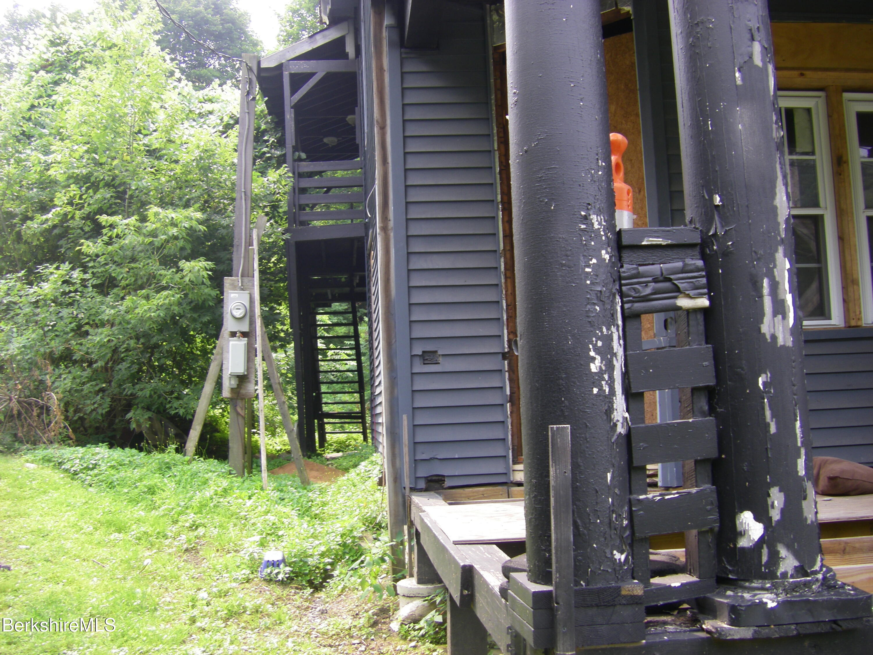 306 Union Street North Adams, MA 01247 - Photo 27 of 30 a view of a brick house with a yard