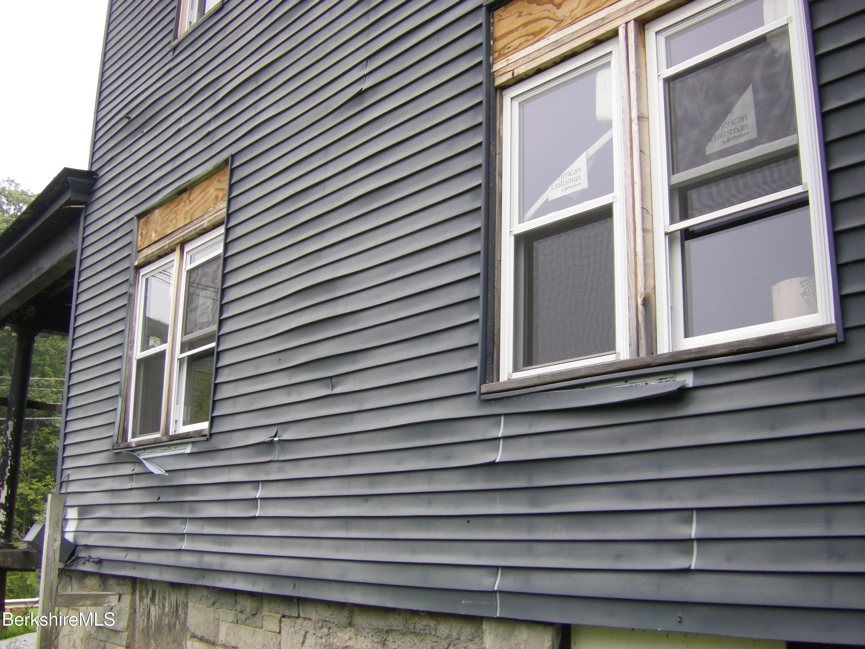 306 Union Street North Adams, MA 01247 - Photo 4 of 30 a view of a house with a balcony