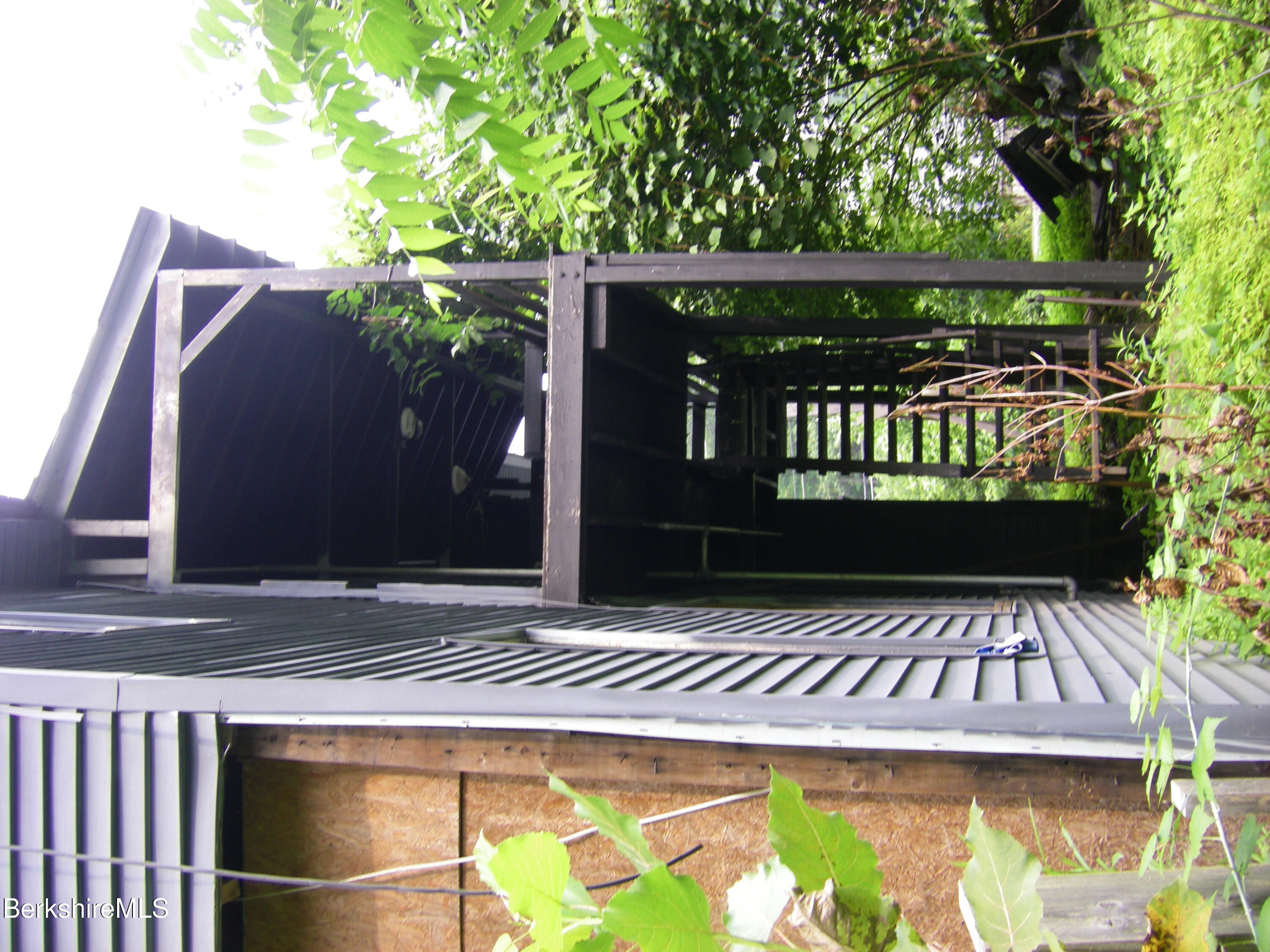 306 Union Street North Adams, MA 01247 - Photo 7 of 30 a front view of a house with a garden