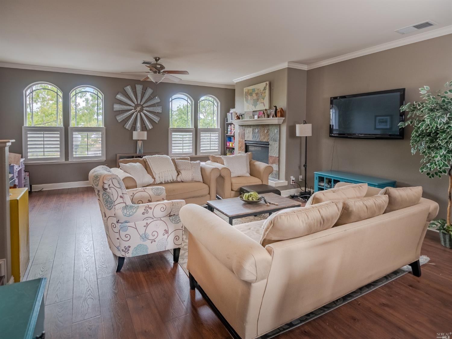 232 Windsor River Road Windsor, CA 95492 - Photo 1 of 1 a living room with furniture and a flat screen tv