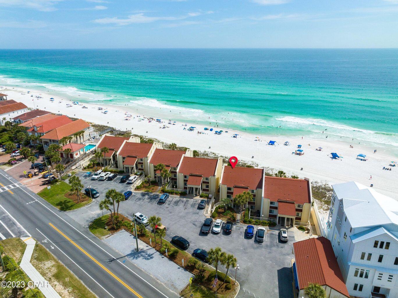 an aerial view of beach and ocean