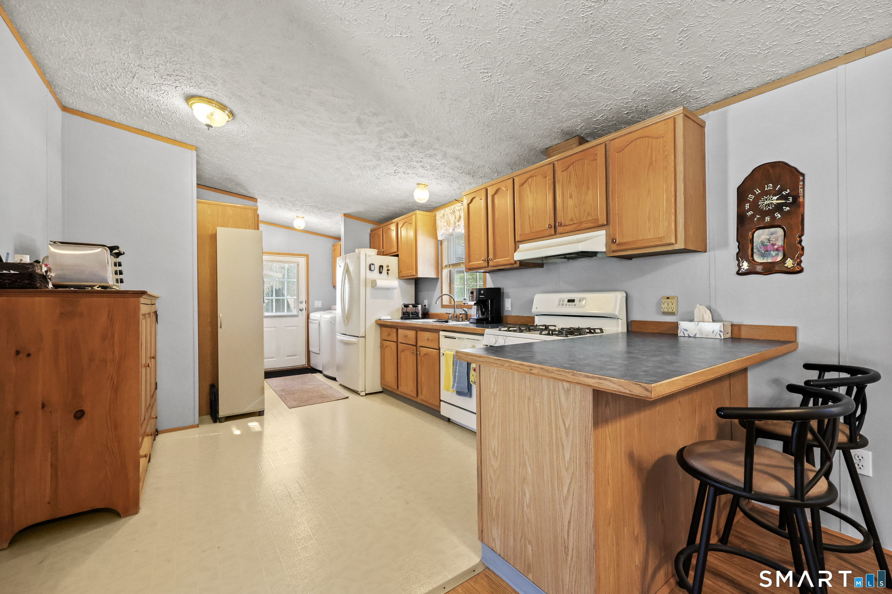 7 Circle Drive Windham, CT 06256 - Photo 17 of 36 Kitchen with breakfast bar