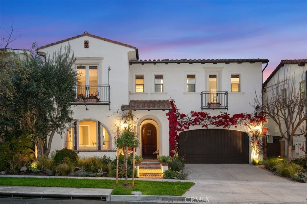 64 Clifford Irvine, CA 92618 - Photo 1 of 1 a front view of a house with a yard