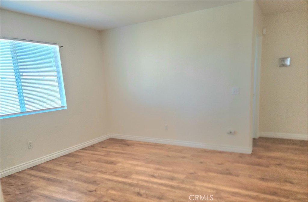11729 Cliffwood Road Victorville, CA 92392 - Photo 7 of 8 wooden floor in an empty room