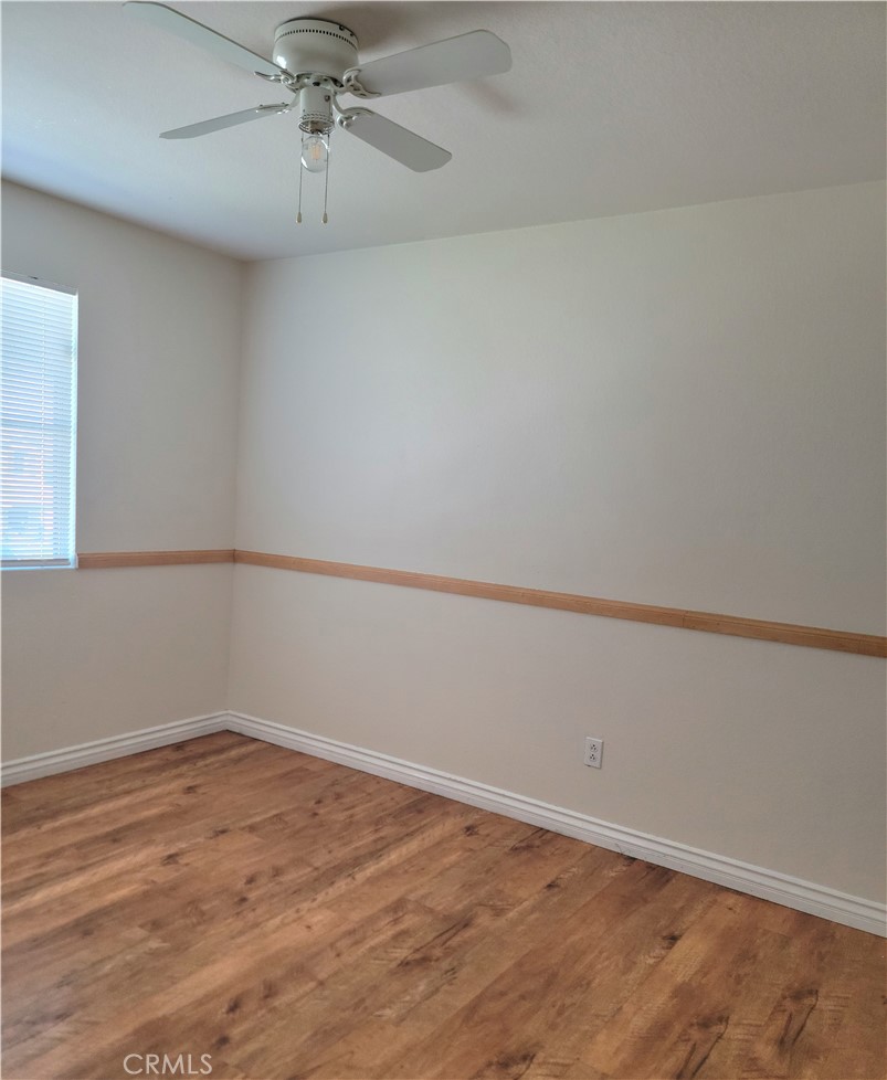 11729 Cliffwood Road Victorville, CA 92392 - Photo 8 of 8 wooden floor in an empty room