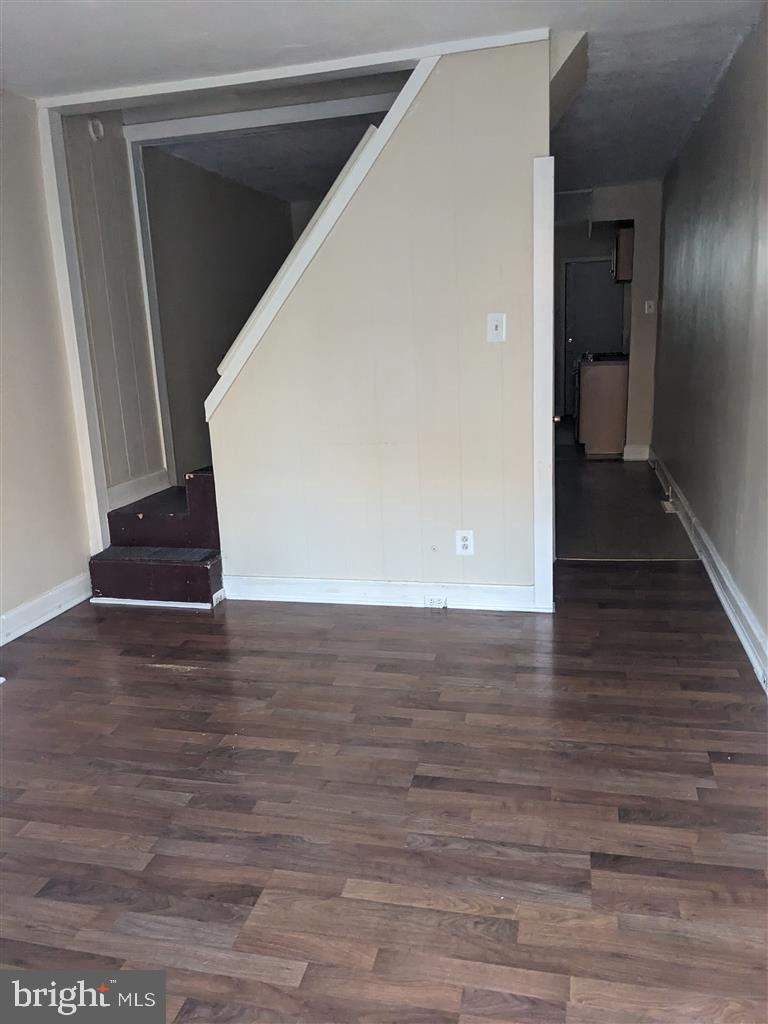 1622 Patapsco Street Baltimore, MD 21230 - Photo 3 of 6 a view of a hallway with wooden floor