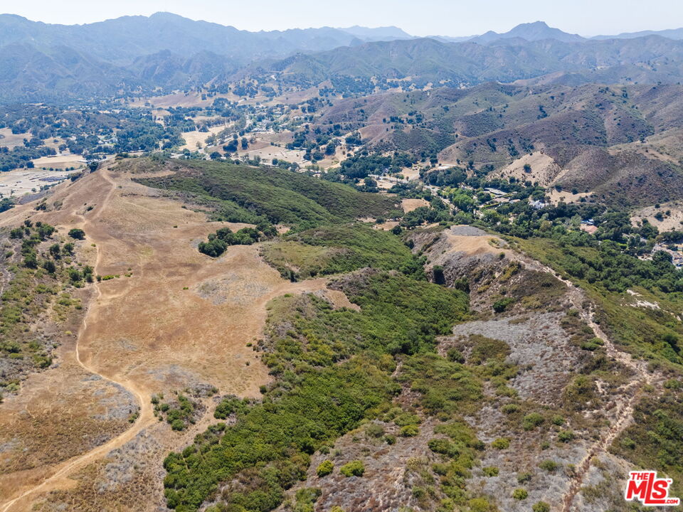 317 Acres - The Calabasas Ranch Calabasas, CA 91302 - Photo 7 of 7 an aerial view of residential house and sandy dunes